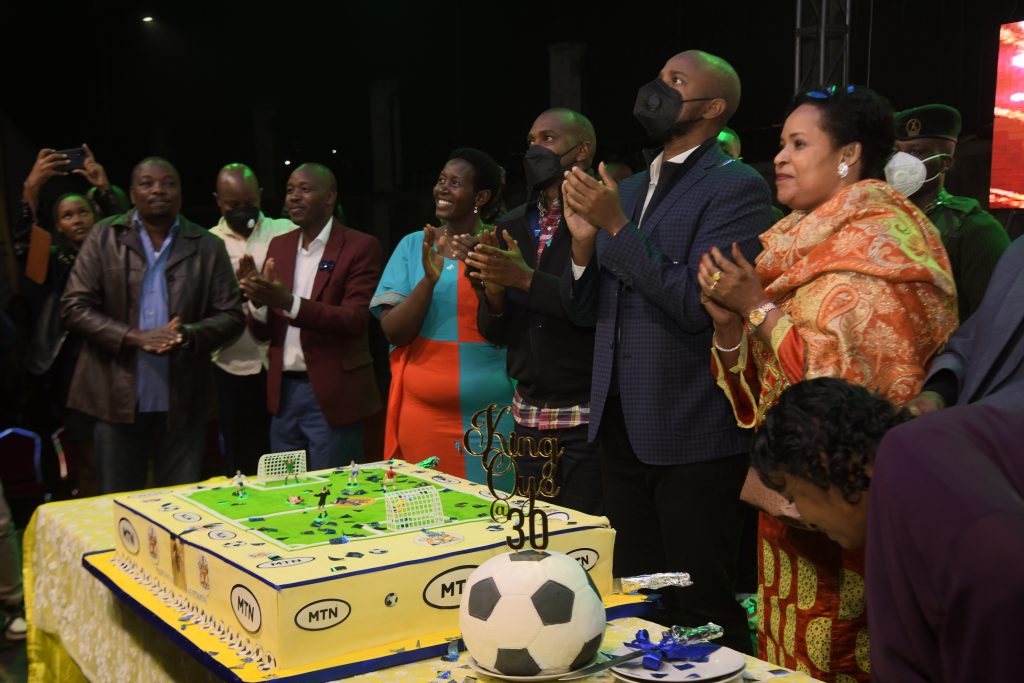 King Oyo 3R and Queen Best Kemigisa 2R moments before cutting King Oyos 30th birthday cake after the final match of the day