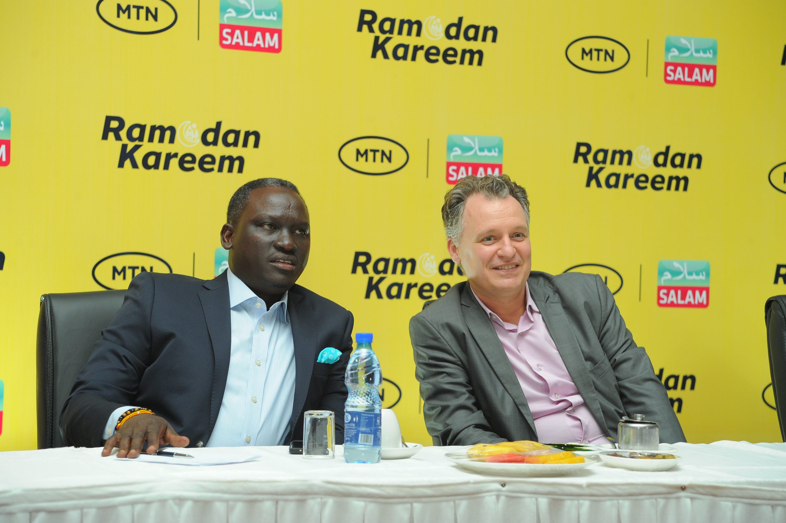 Salam Charitys Kin Karisa and MTN Ugandas CEO at the dinner scaled