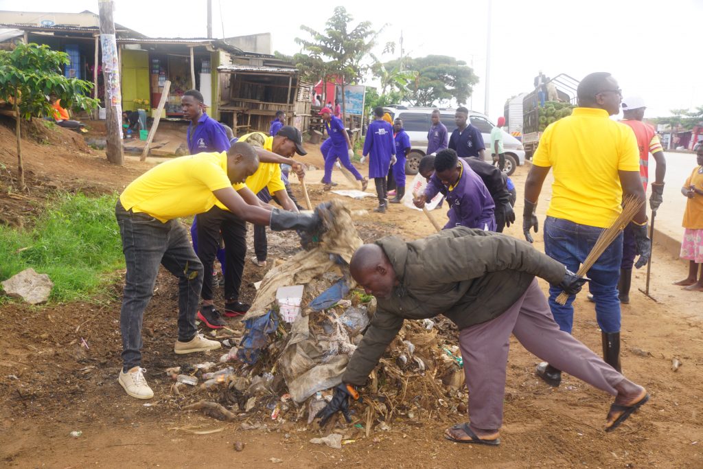 A team of MTN staff undertake in the clean up exercise aimed at maintaining sanitation and hygiene in Masaka City.