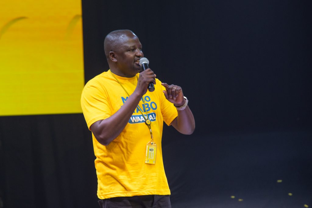 Richard Yego MTN Mobile Money Uganda Limited Managing Director informs MTN customers of the opportunity to win a car by simply depositing UGX20000 or more on their MTN MoMo accounts