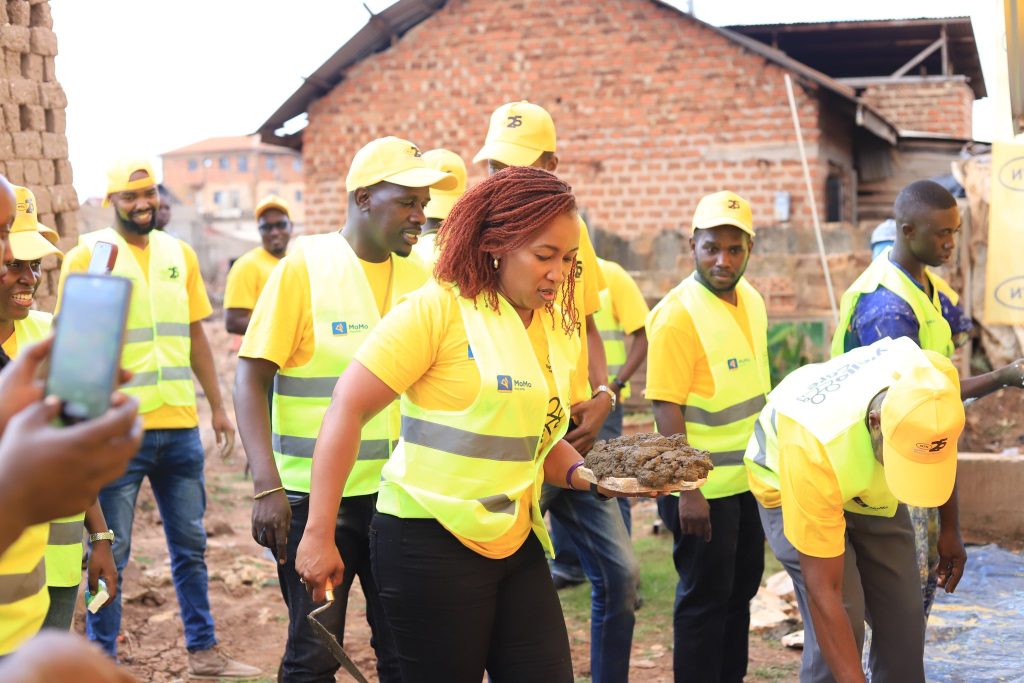 MTN Uganda CEO Sylvia Mulinge joins staff to a community work at the Disability Employment Link Project Uganda located in Bwaise Kampala during the launch of this years 21 Days of Yello Care 1