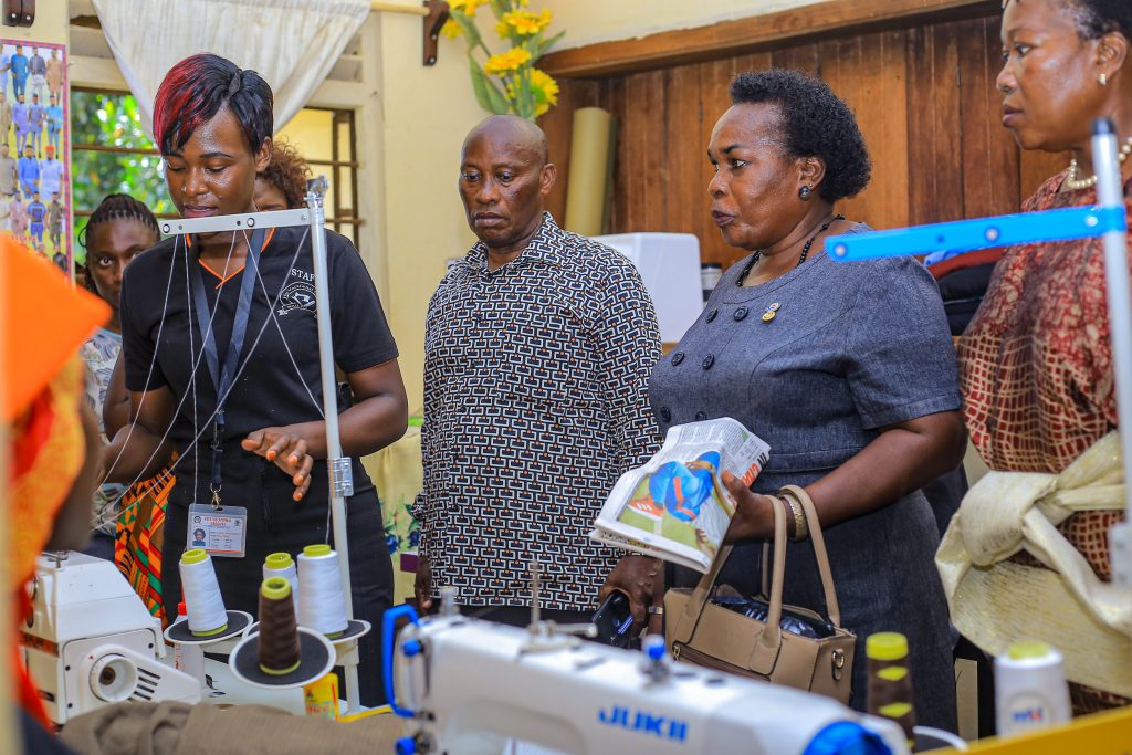 Guests looks at the MTNs newly donated moden tailoring machines to Heta Vocational Grounds in Jinja on March.15