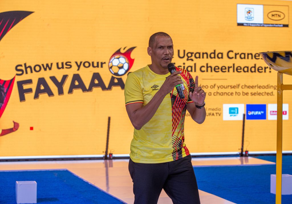 FUFA Chief Executive Officer Edgar Watson speaking at the launch of the Uganda Fayaa cheerleader search