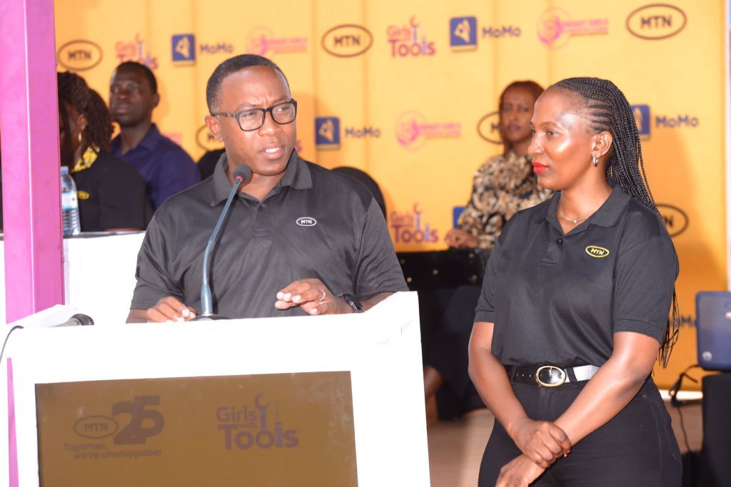 MTN Foundation Senior Manager Bryan Mbasa and Josephine Nassiwa Manager Wholesale Accounts at MTN Uganda speaking to graduands during the MTN Girls in Tech graduation held on May 29 2024